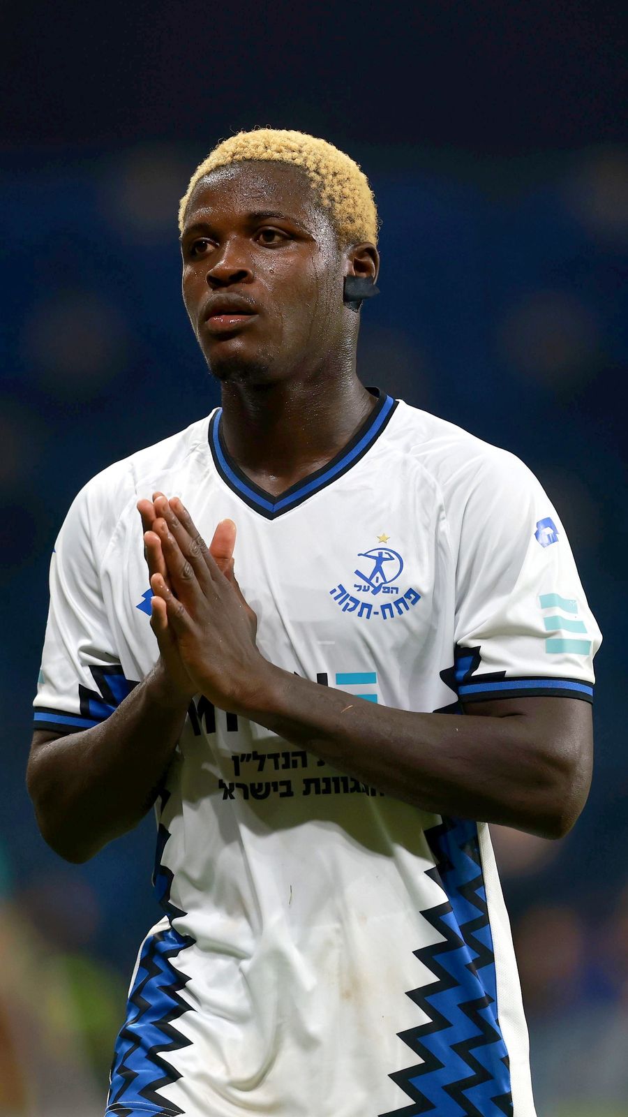 Yves Erick Bile (Hapoel Petah Tikva) are clapping hands together