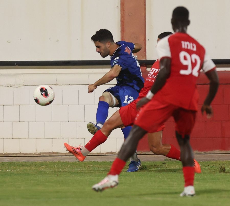 Stav Israeli (#12, Hapoel Petah Tikva) jumps to head the ball