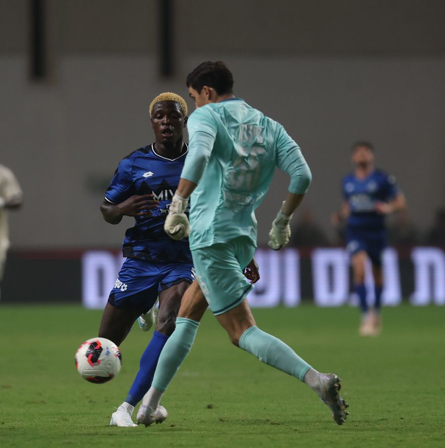 Yves Erick Bile (Hapoel Petah Tikva) is preparing to strike the ball with his right foot