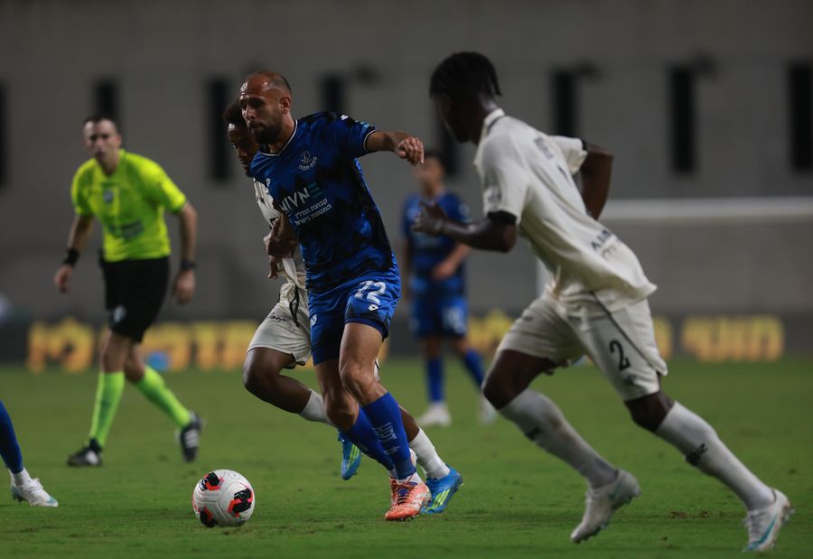 Stav Israeli (#12, Hapoel Petah Tikva) defends against an opponent