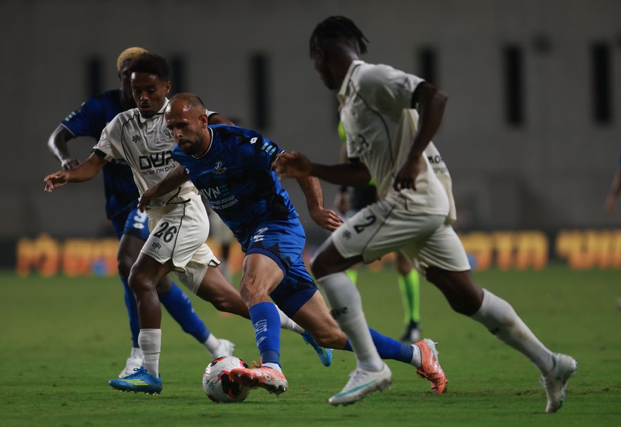 Yazen Nassar (Hapoel Petah Tikva) strikes the ball with his right foot