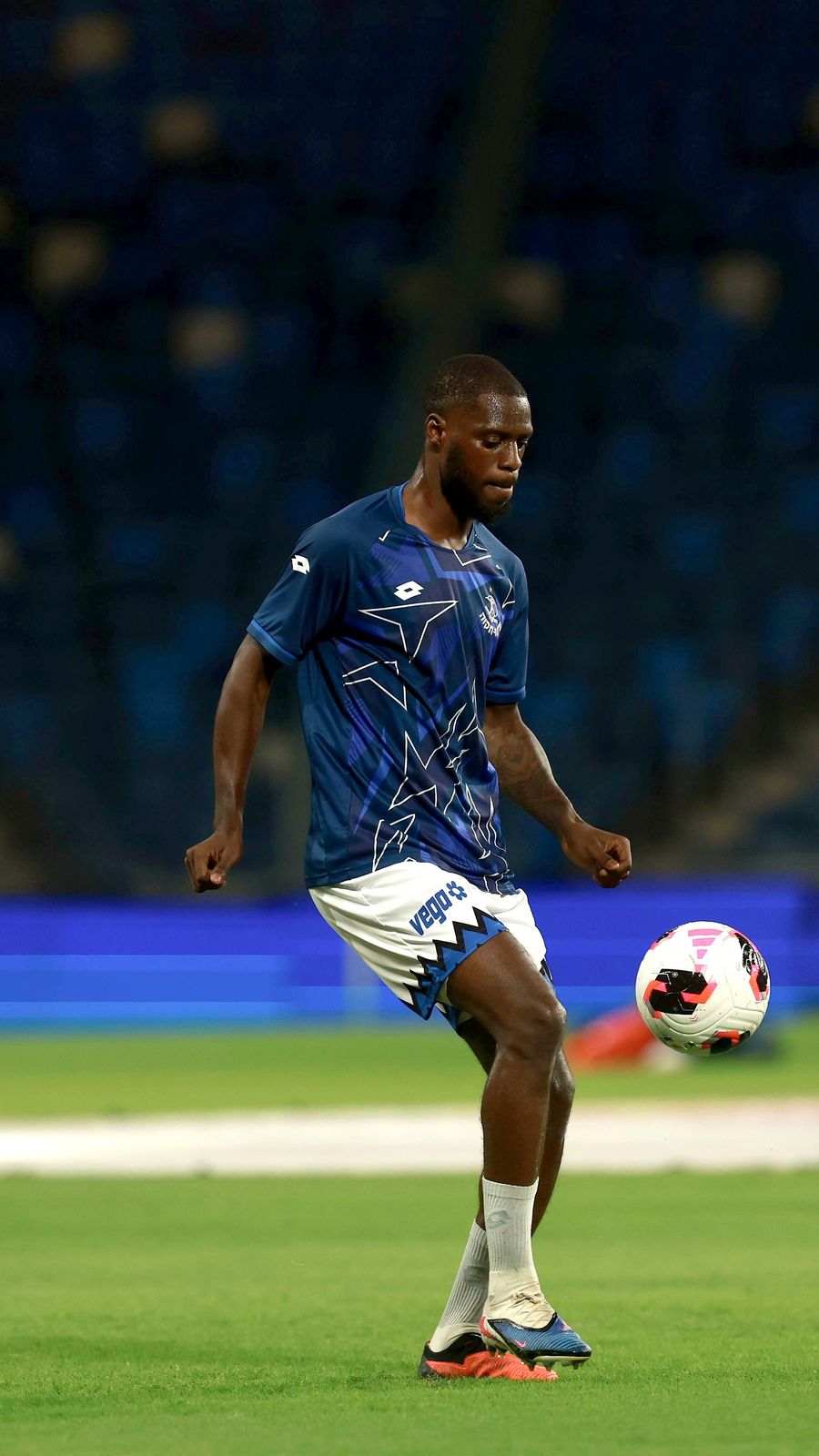 Alex Moussounda (Hapoel Petah Tikva) strikes the ball with his right foot