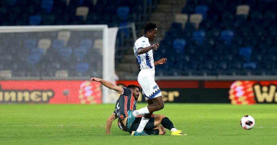 Naor Sabag (Hapoel Haifa) is lying on the ground, attempting to block the ball