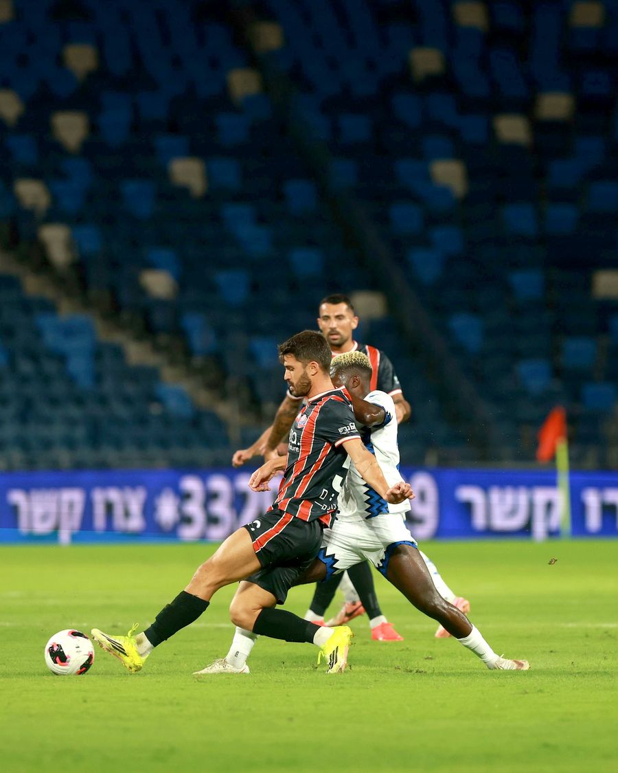 Shay Elias (Hapoel Haifa) strikes the ball with his right foot