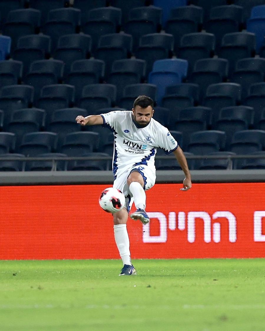 Harel Shalom (Hapoel Petah Tikva) strikes the ball with his right foot