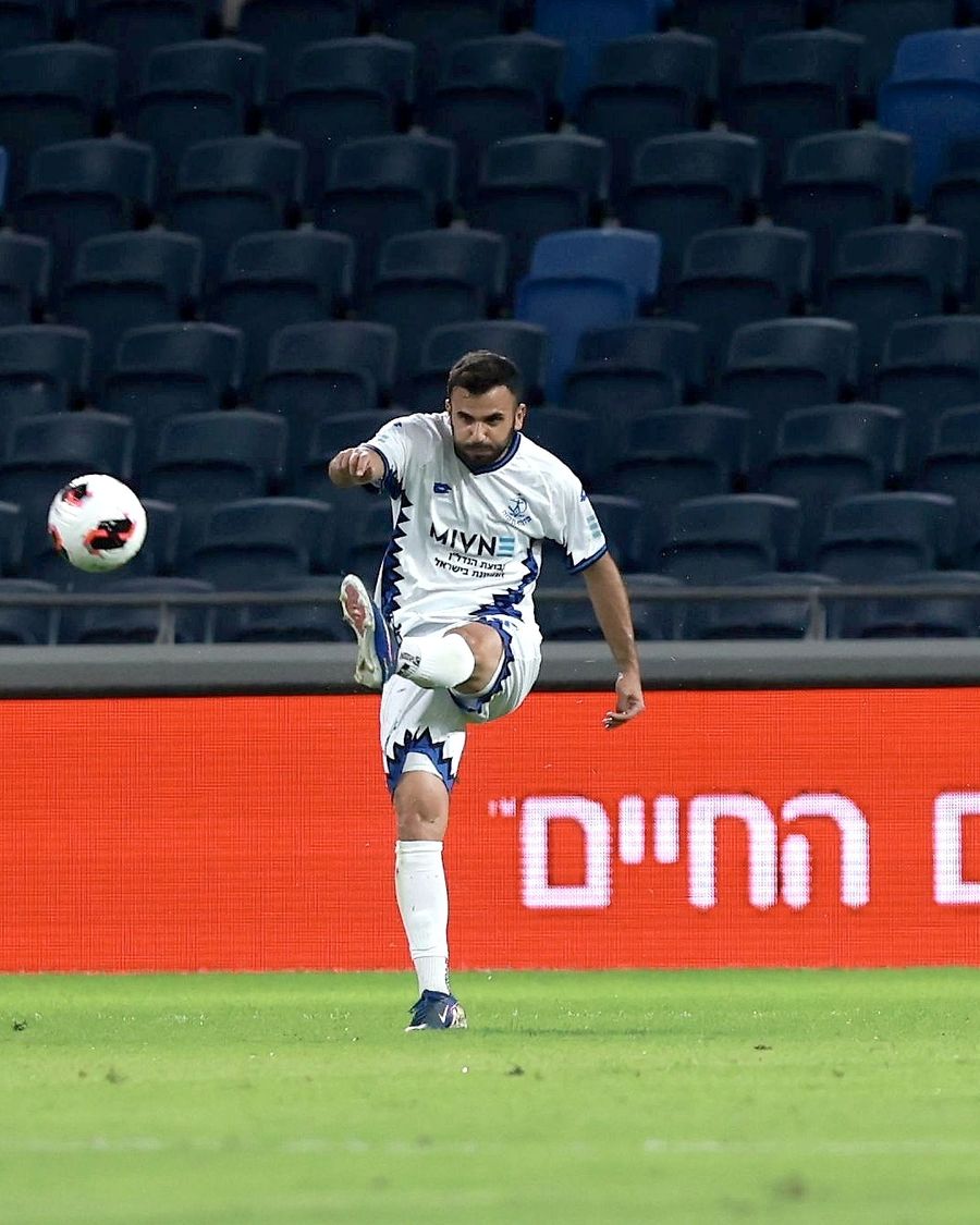 Harel Shalom (Hapoel Petah Tikva) strikes the ball with his right foot