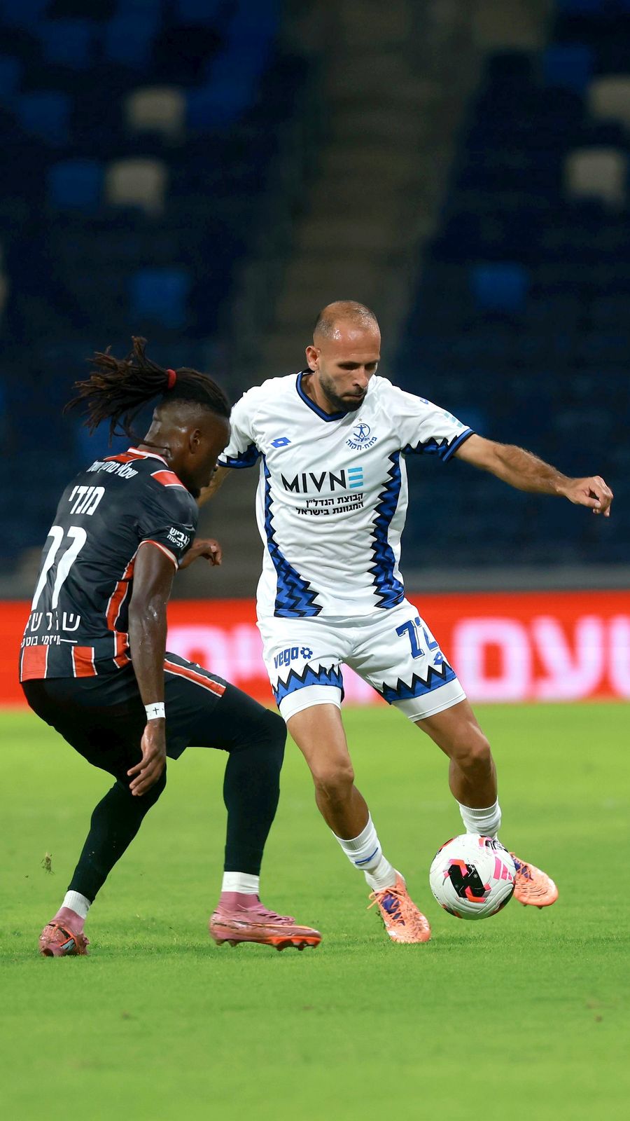 Yazen Nassar (Hapoel Petah Tikva) strikes the ball with his right foot