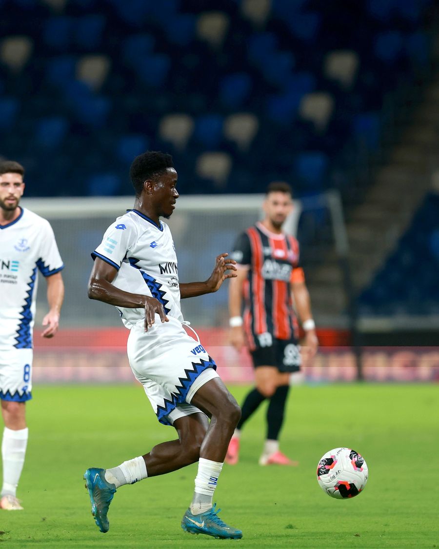 Karim Kimvuidi (Hapoel Petah Tikva) and Tomer Altman (Hapoel Petah Tikva) run towards the ball