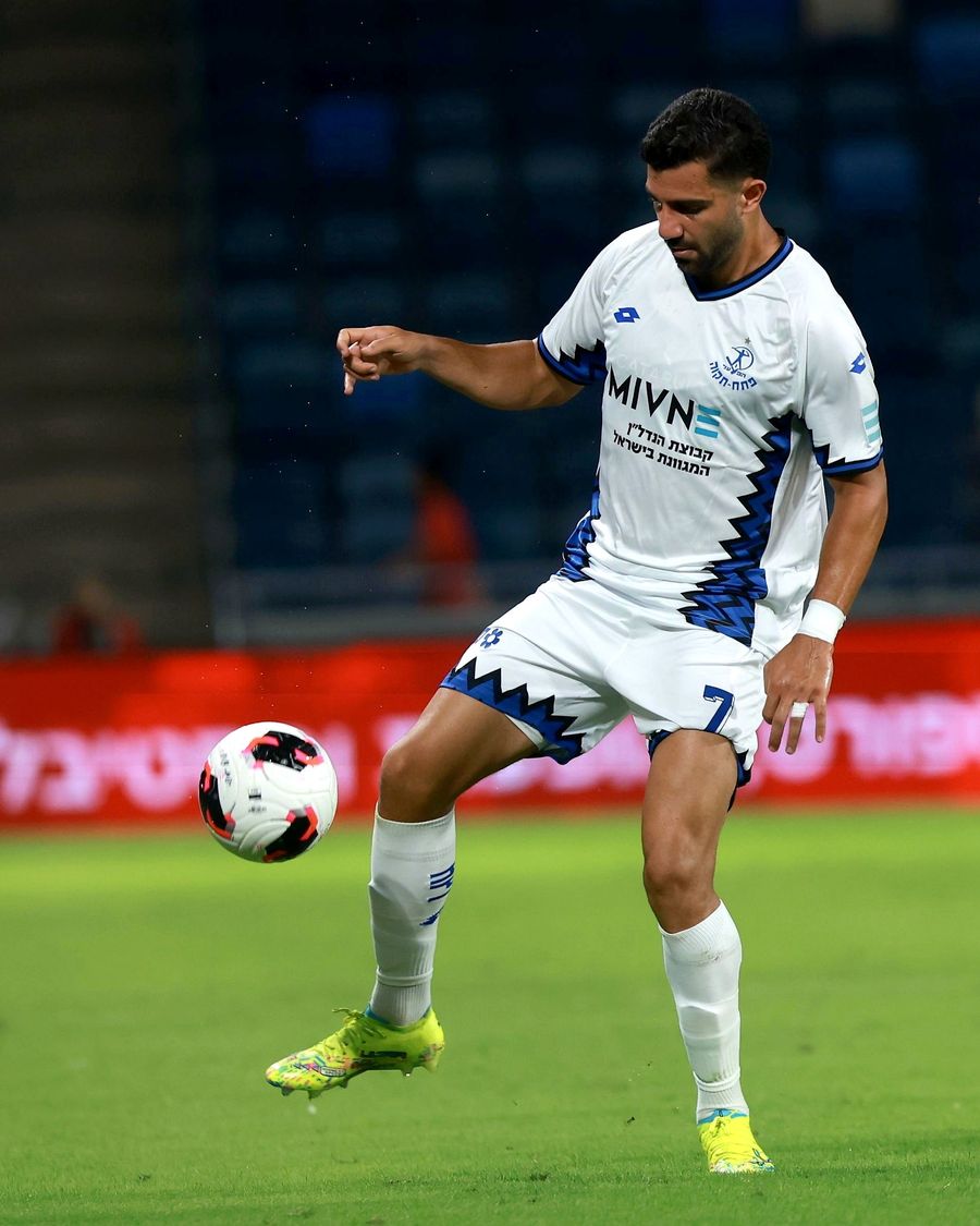 Roy Levy (Hapoel Petah Tikva) strikes the ball with his right foot